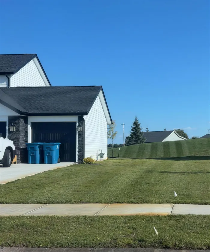 Freshly mowed front lawn with straight mow lines